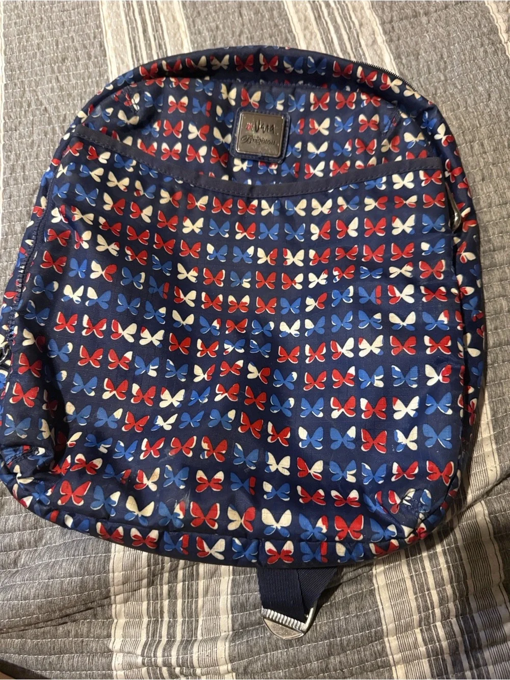 Brighton Navy Backpack with Red, Blue & White Butterfly Motif